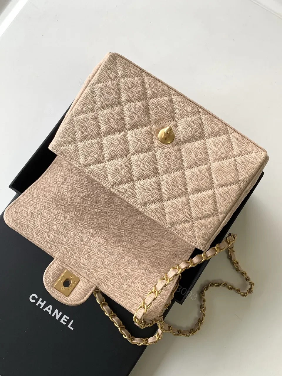 View 7 of Soft Beige Quilted Bag with Luxe Chain – Compact Luxury Tote