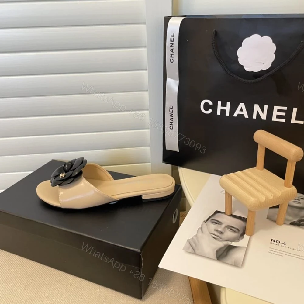 View 7 of Chanel Black Camellia Slides Beige