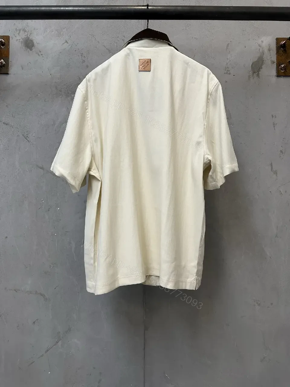 View 10 of White Cotton Polo Shirt with Black Accent Louis Vuitton Style Key Feature Pocket Short Sleeve Shirt
