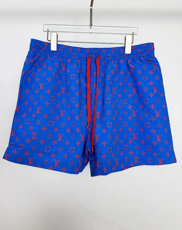 Blue Louis Vuitton Monogram Swim Shorts with Red Drawstring — view 1