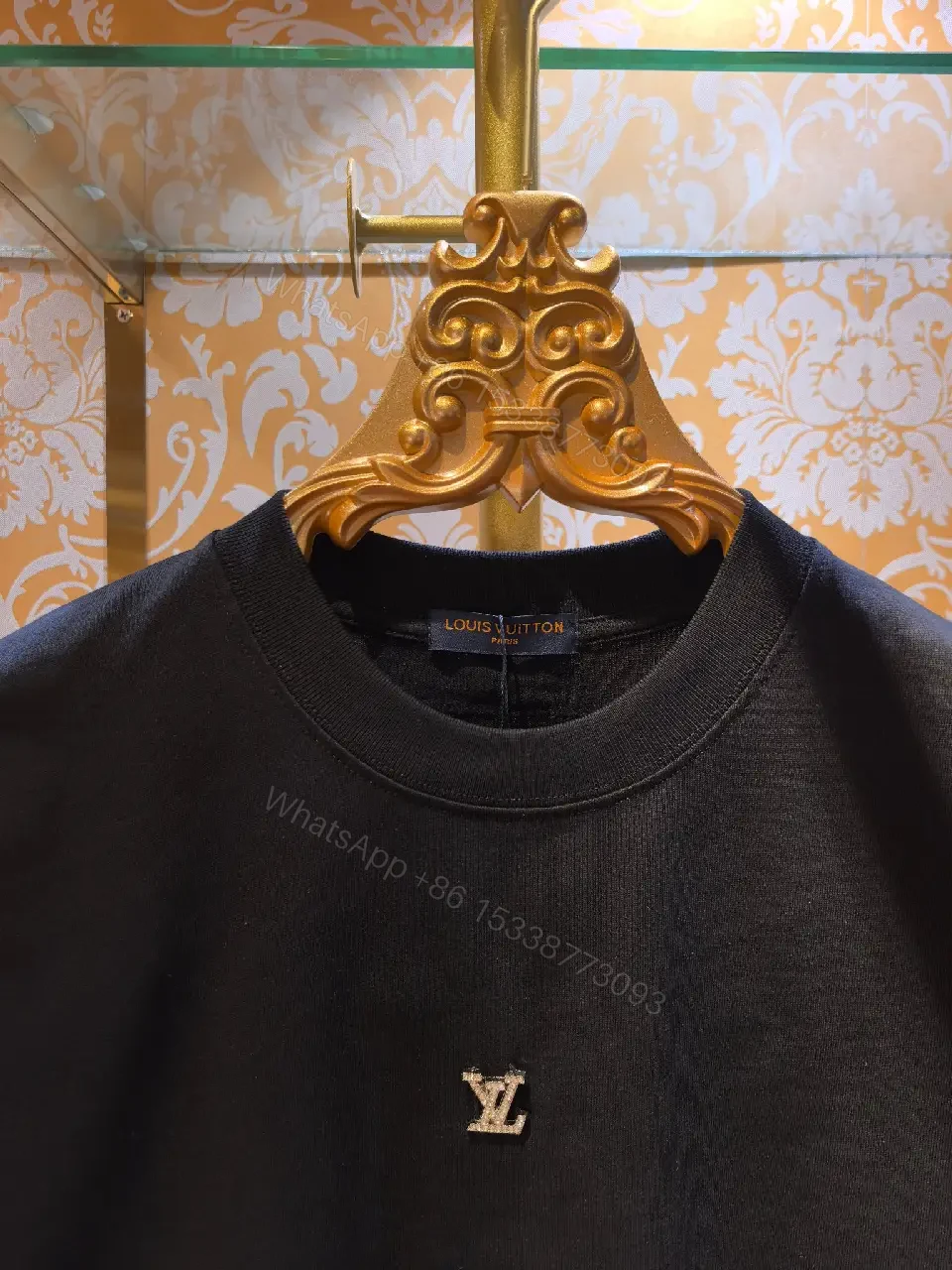 View 4 of Minimalist Black Cotton Tee with Subtle LV Emblem