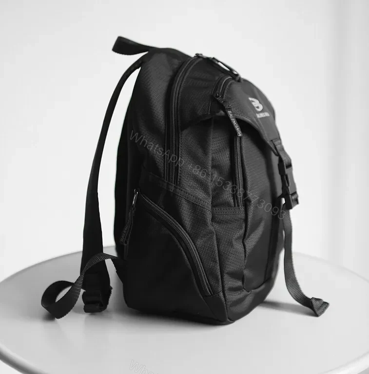View 7 of Black Tech-Ready Backpack, Minimal Balenciaga-Inspired, Compact, Water-Resistant, Everyday Carry