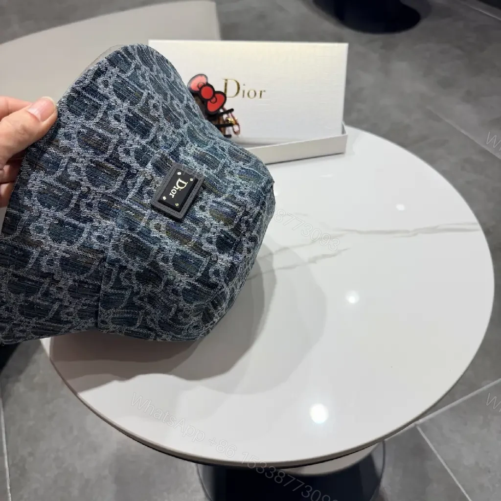 View 10 of Denim-Texture Bucket Hat with Monogram Detail, Luxury Everyday