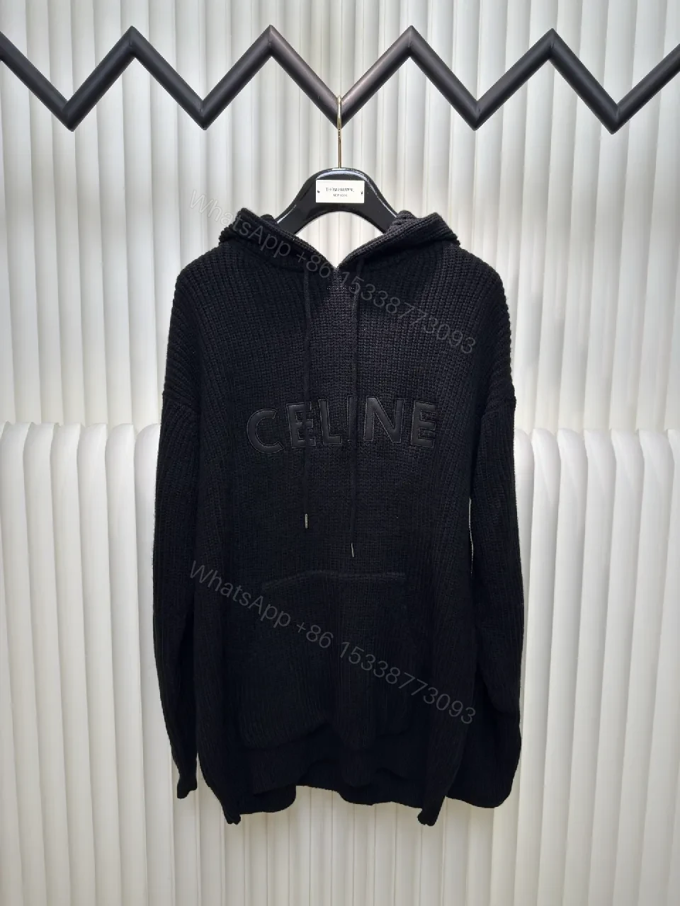 Chunky Knit Hoodie in Deep Black with Subtle Logo Embossing, Modern Luxe — view 1