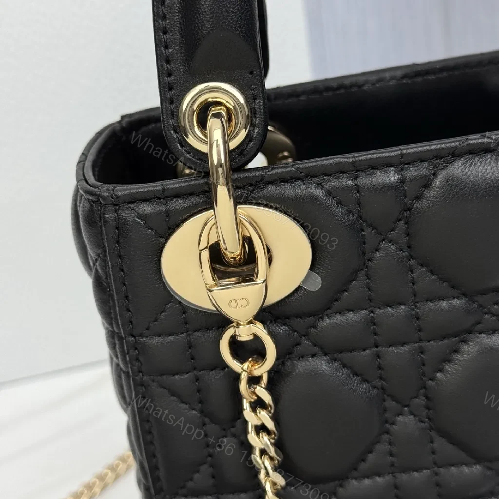 View 8 of Small Black Quilted Mini Bag with Gold Hardware - Elegant Compact Crossbody