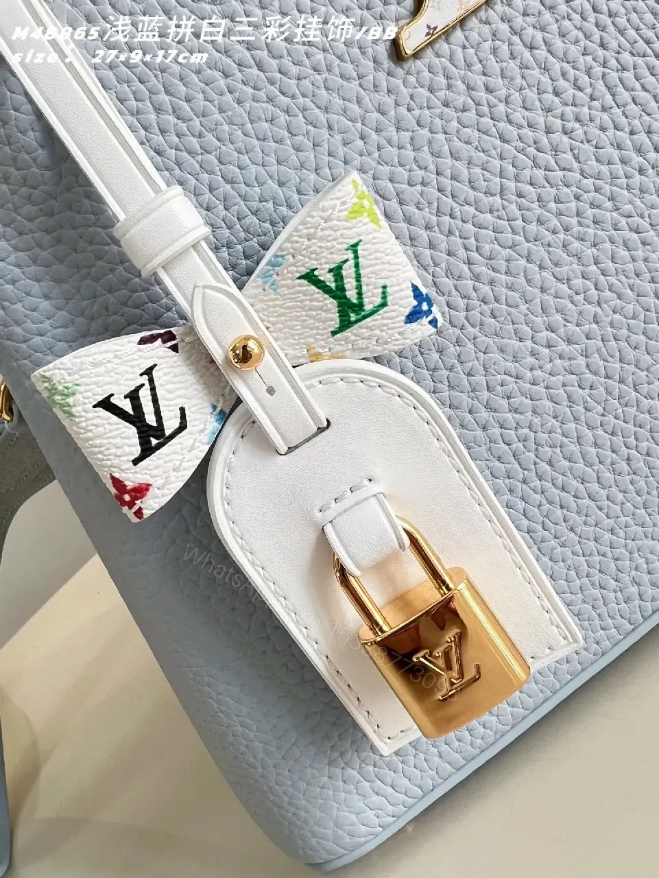 View 4 of Light Blue Leather Handbag with Gold Hardware Details