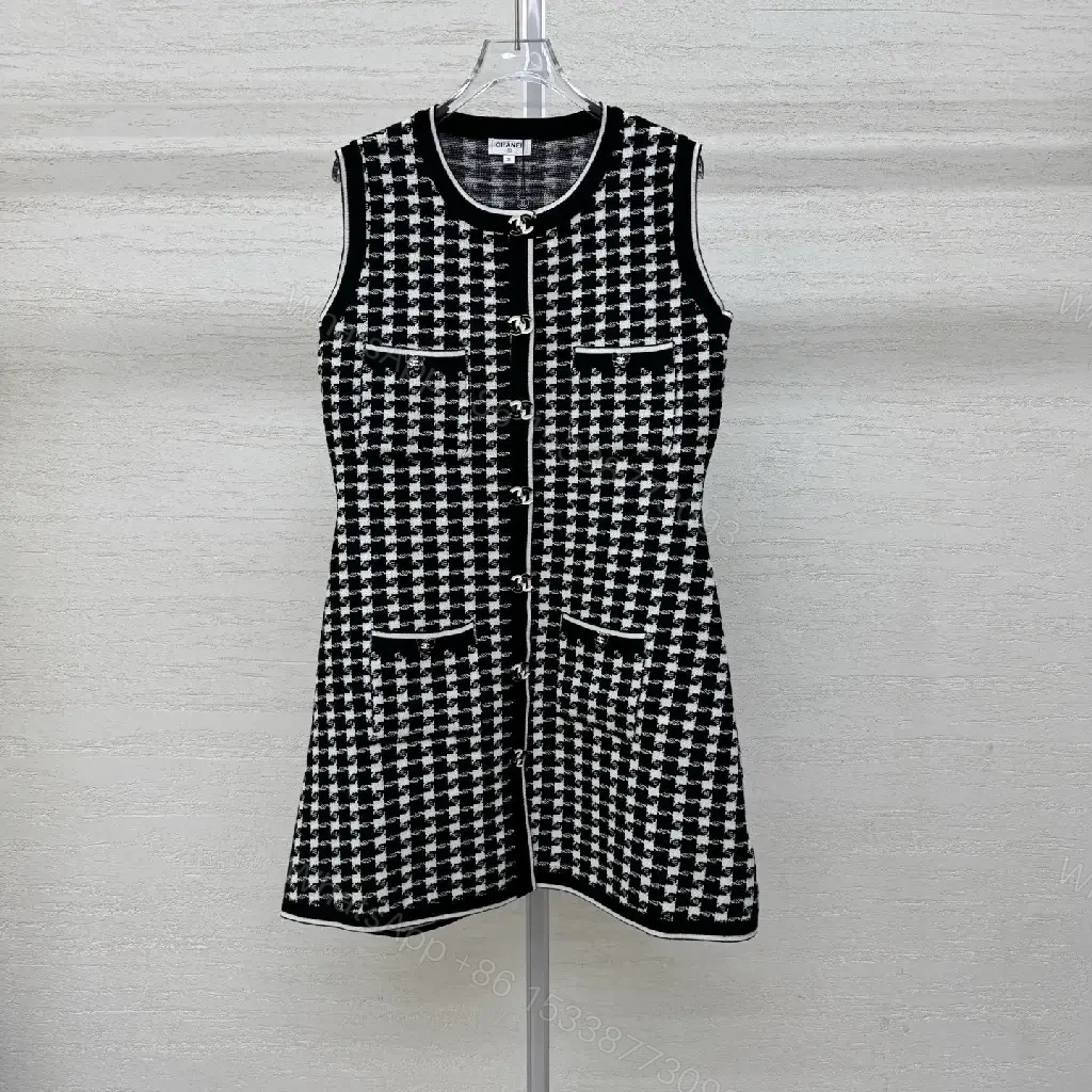 View 3 of Chic Textured Sleeveless Dress with Bold Houndstooth Pattern
