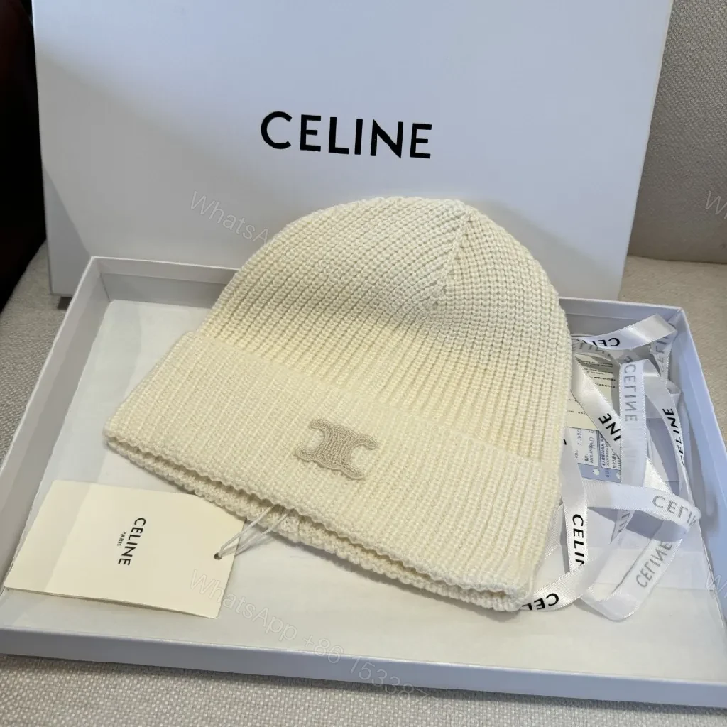View 2 of Cream Knit Beanie + Ribbed Material + Minimalist Style + Subtle Monogram + Beanie