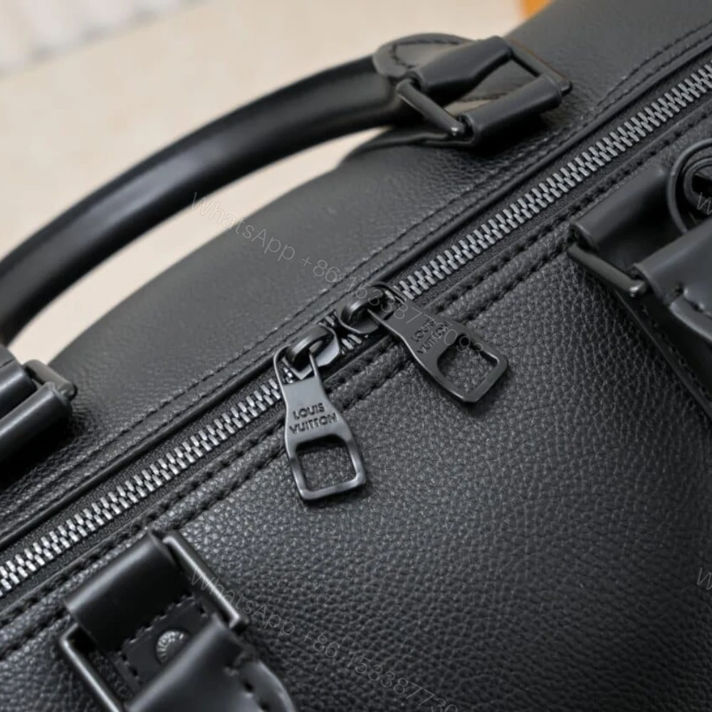 View 6 of Louis Vuitton Keepall Bandoulière 50 Black M21420