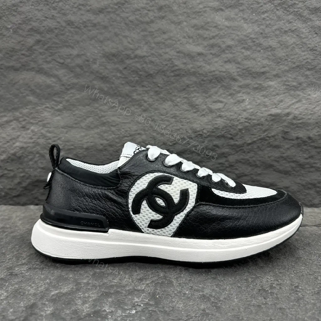 Monochrome Leather-Textured High-Tops: Modern Luxury Sneakers — view 1