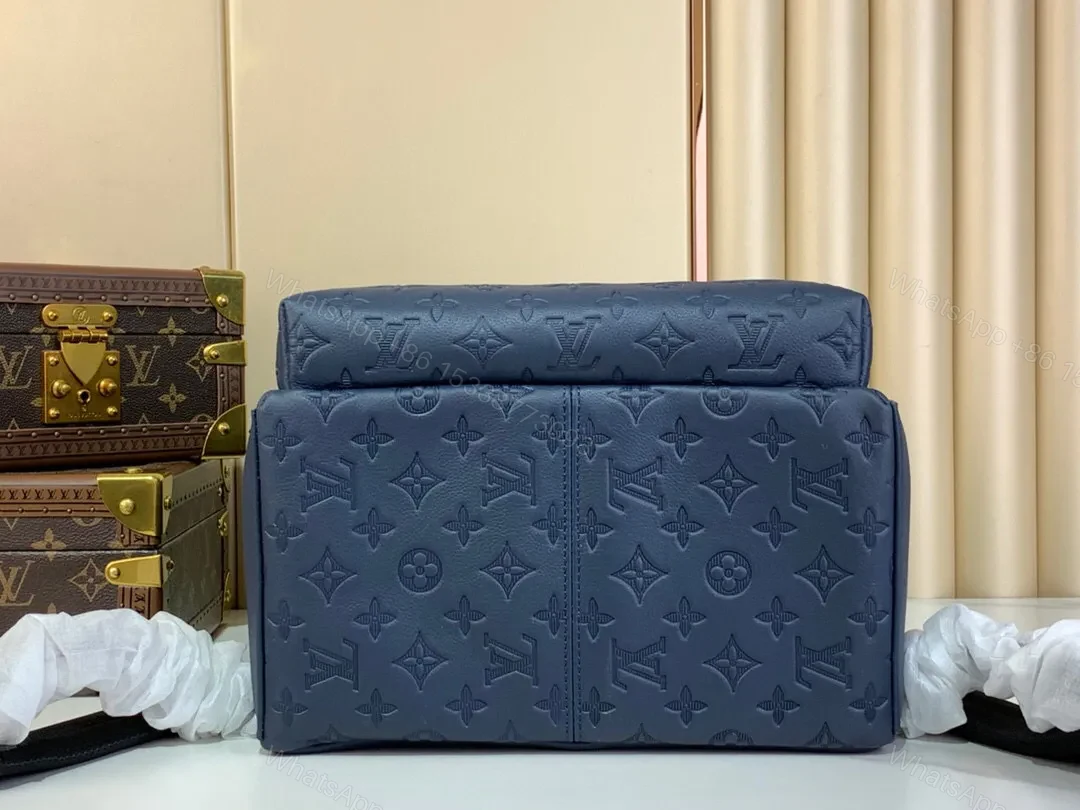View 7 of Compact Monogram Backpack: Textured Luxury, Everyday-Ready