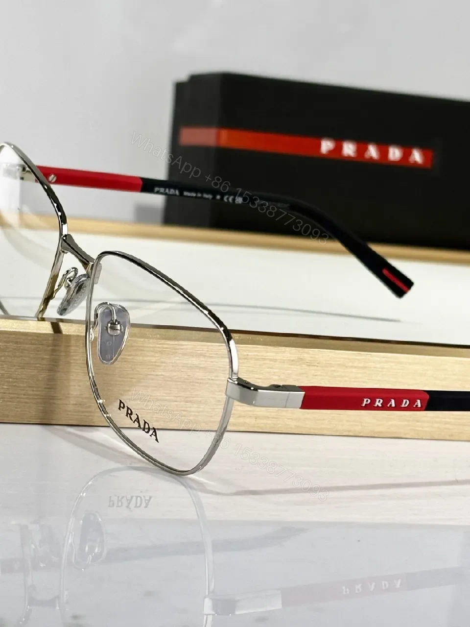 View 9 of Silver Metal Minimalist Precision Eyewear with Red Accents, Luxury Glasses
