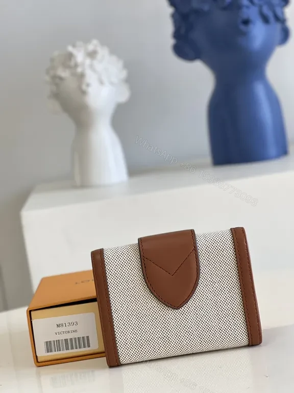 View 8 of Iconic Victorine Wallet: Compact Luxury Canvas & Leather Trim