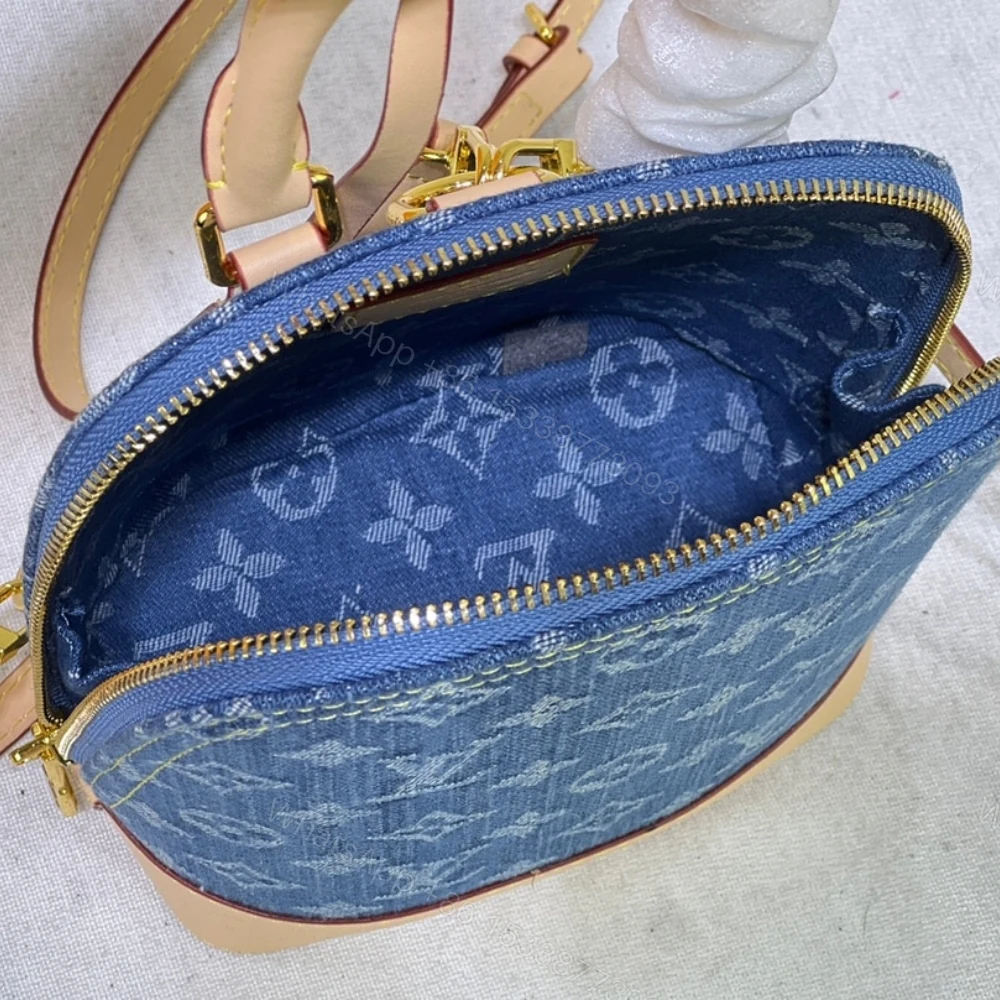 View 10 of Louis Vuitton Alma Backpack Blue Denim 20Cm