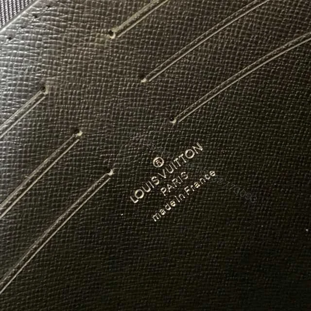 View 4 of LOUIS VUITTON POCHETTE VOYAGE MM TAIGA LEATHER M30675