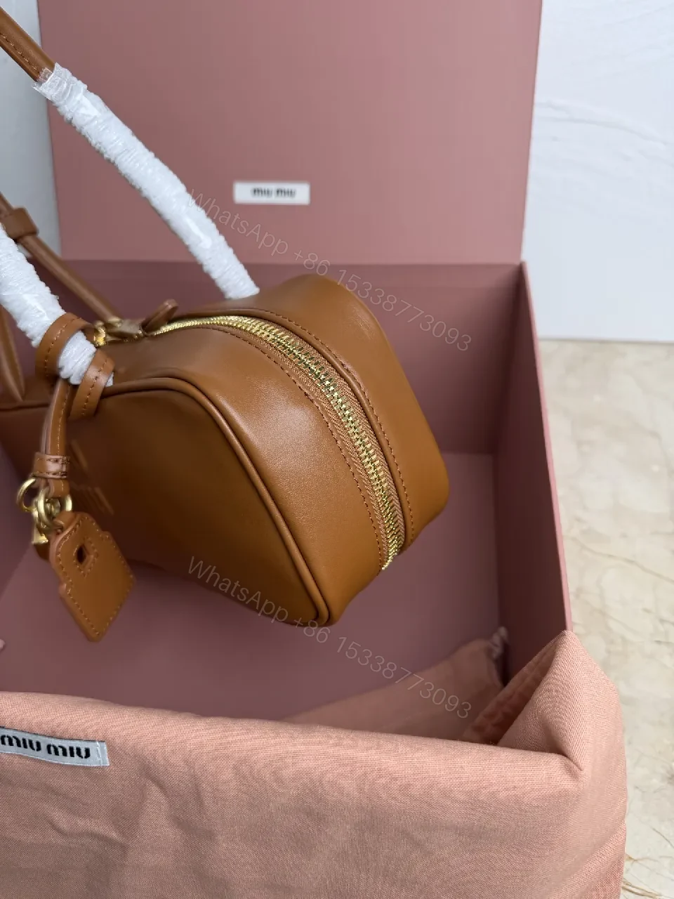 View 3 of Tan Leather Structured Crossbody: Modern Craftsmanship