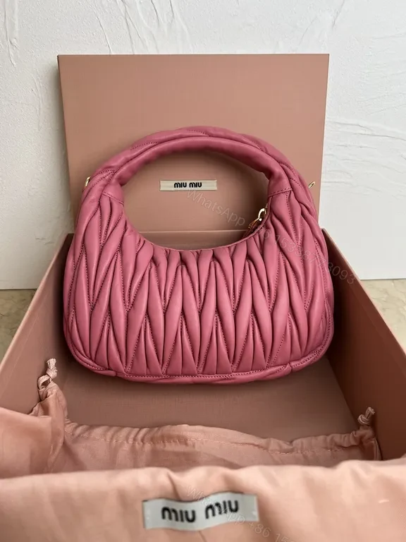 View 3 of Pink Quilted Miu Miu Mini Bag â€“ Luxury Everyday Chic