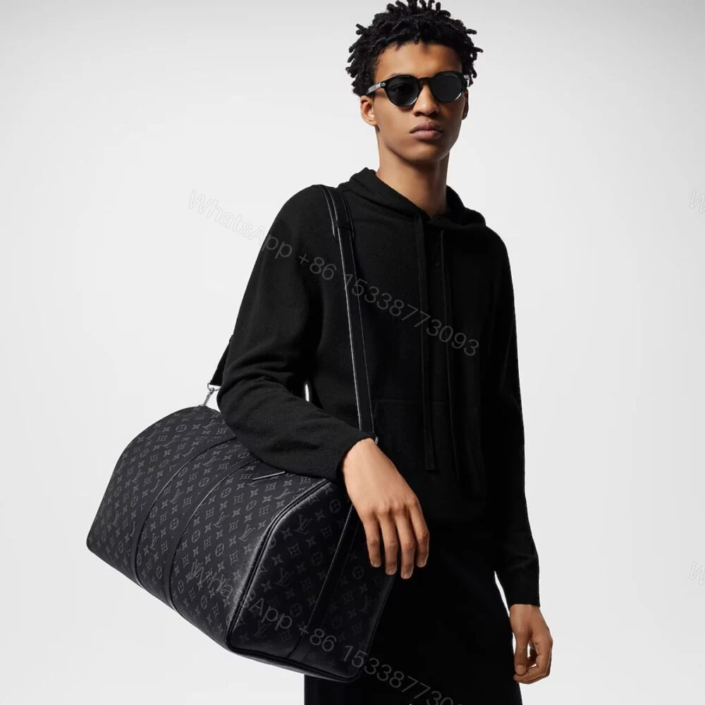 View 11 of Louis Vuitton Keepall Bandouliere 55 Monogram Eclipse Canvas 55cm LV M40605