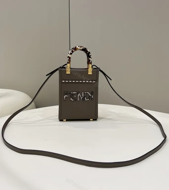 Structured Mini Bag: Sculpted Logo, Tortho Handle, Gold Accents — view 1