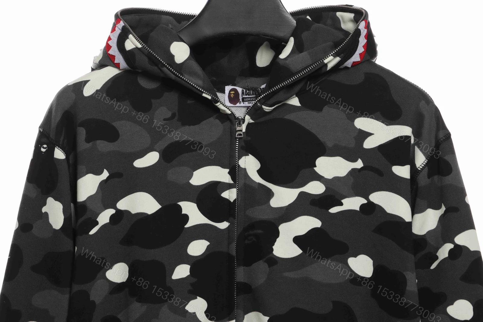 View 2 of BAPE classic black and white camouflage patchwork luminous hoodie Black