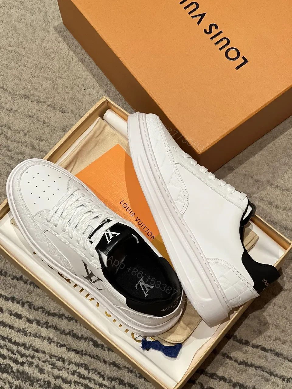 View 7 of White Leather High-Top Sneakers: Subtle Luxury Detailing
