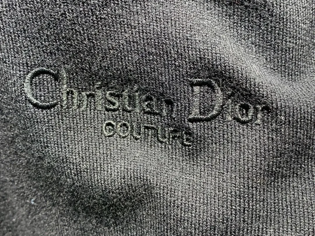 View 5 of Dark Knit Polo: Subtle Monogram Detail, Elevated Everyday Wear