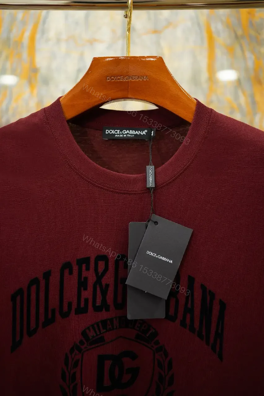 View 4 of Burgundy Short-Sleeve Crewneck T-Shirt with Black Logo Emblem