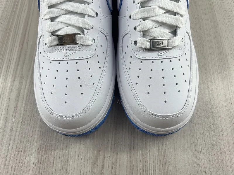 View 10 of White & Blue Minimalist Leather Sneaker â€“ Low-Top Comfort