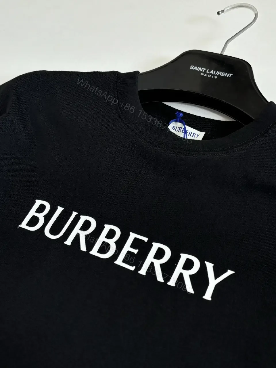 View 7 of Black Cotton Tee, Minimal Logo, Elevated Streetwear, All-Day Comfort, Tee