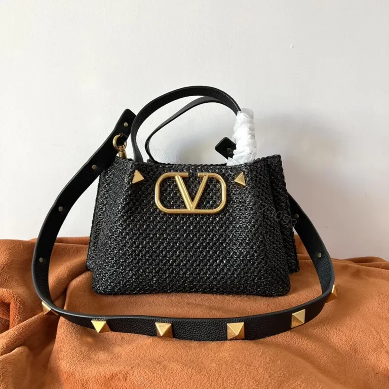 View 9 of Black Woven Luxe Handbag: Compact, Gold-Accent Style Bag