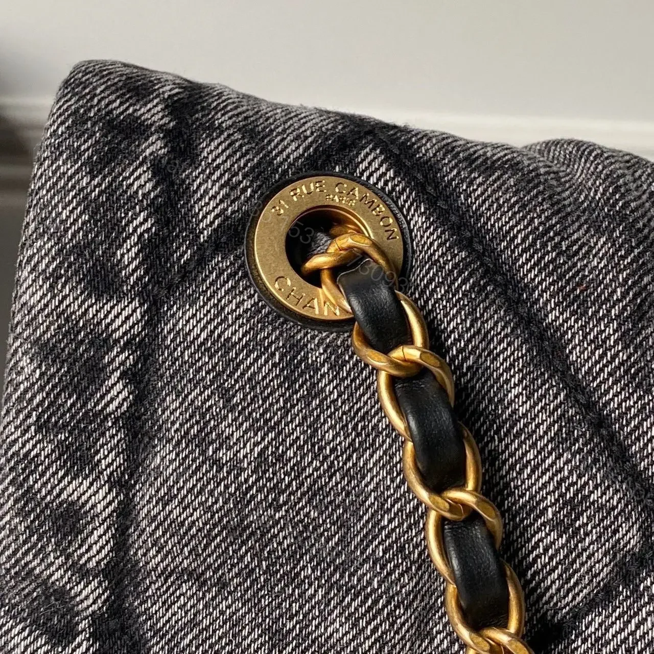 View 4 of Chanel Maxi Flapbag in washed denim with gold-tone metal hardware