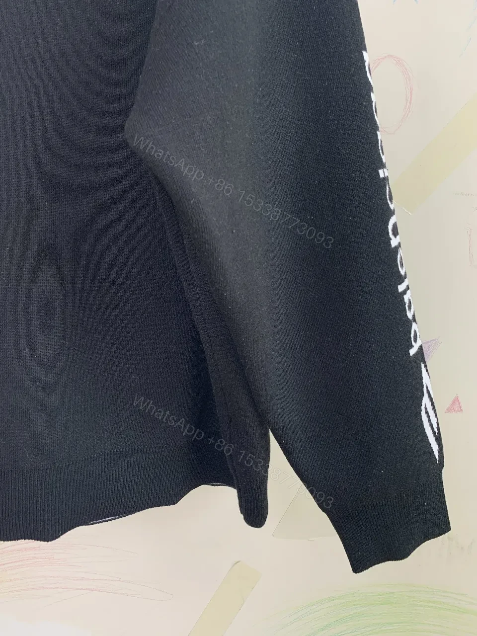 View 2 of Black Knit Luxe: Bold Texture, Subtle Branding Knitwear