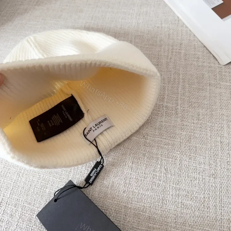 View 8 of Minimalist Knit Beanie â€” Ivory, Premium Knit Blend, Crest Logo, Everyday Luxury
