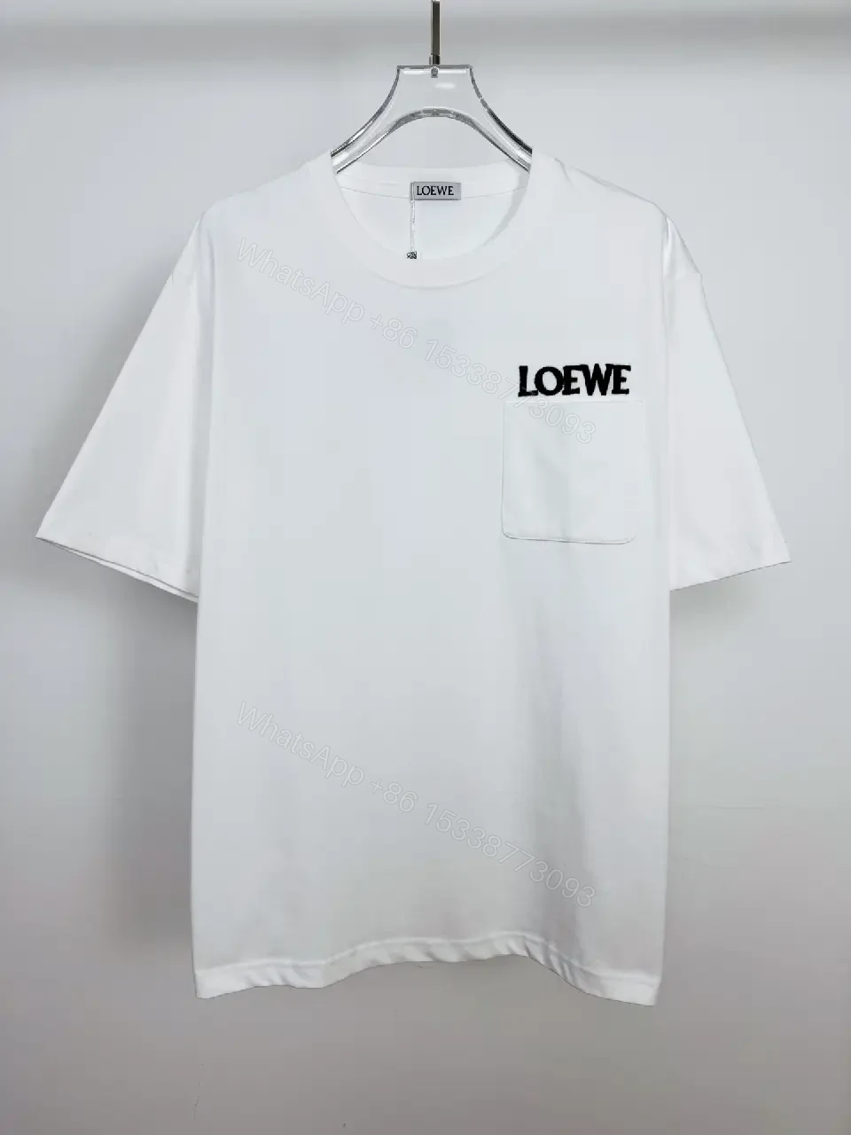View 5 of Minimalist White Cotton Tee with Bold Pocket, Everyday Luxury Top