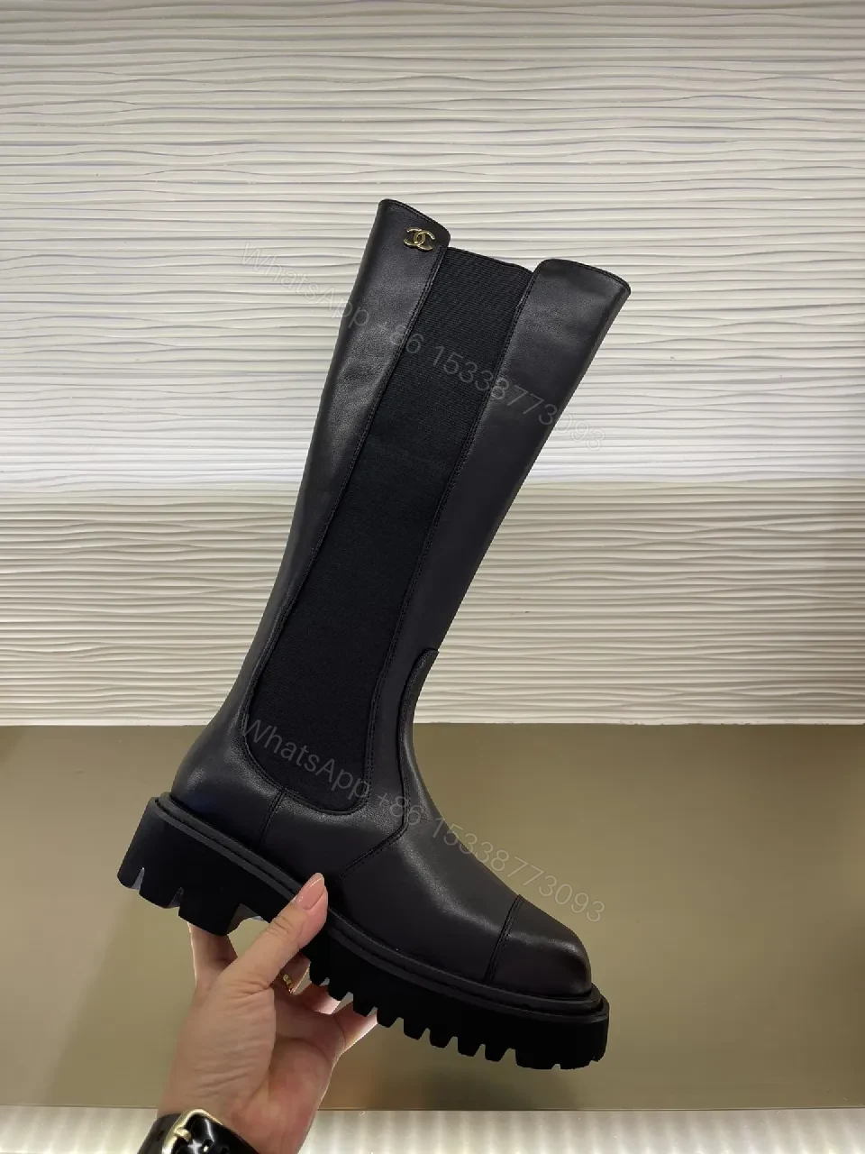 View 2 of Chic Knee-High Boots with Signature Hardware Leather-Luxe Style