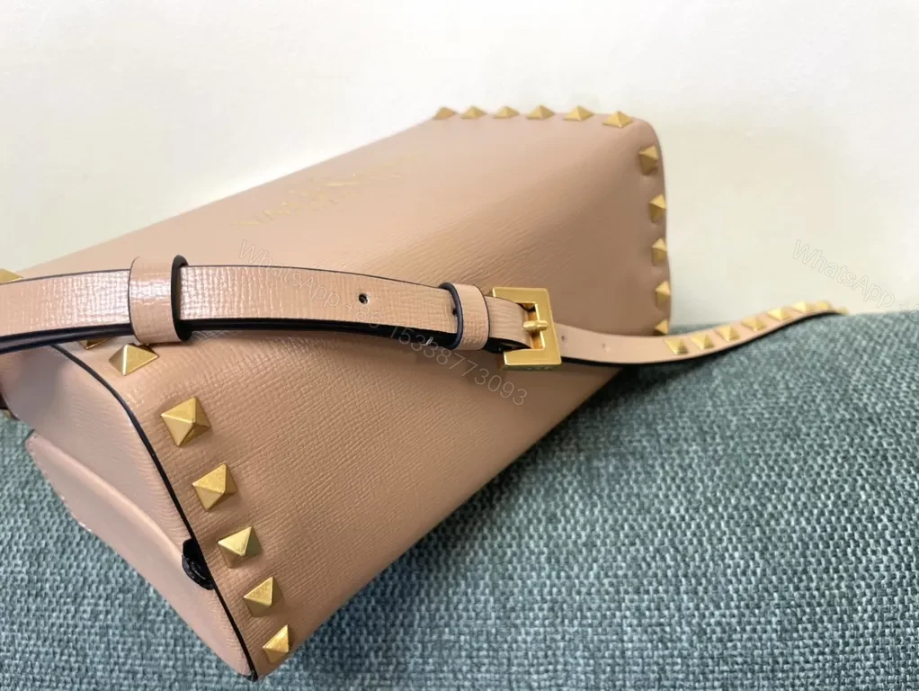 View 2 of Chic Pink Rockstud Mini Bag: Compact Luxury Handbag