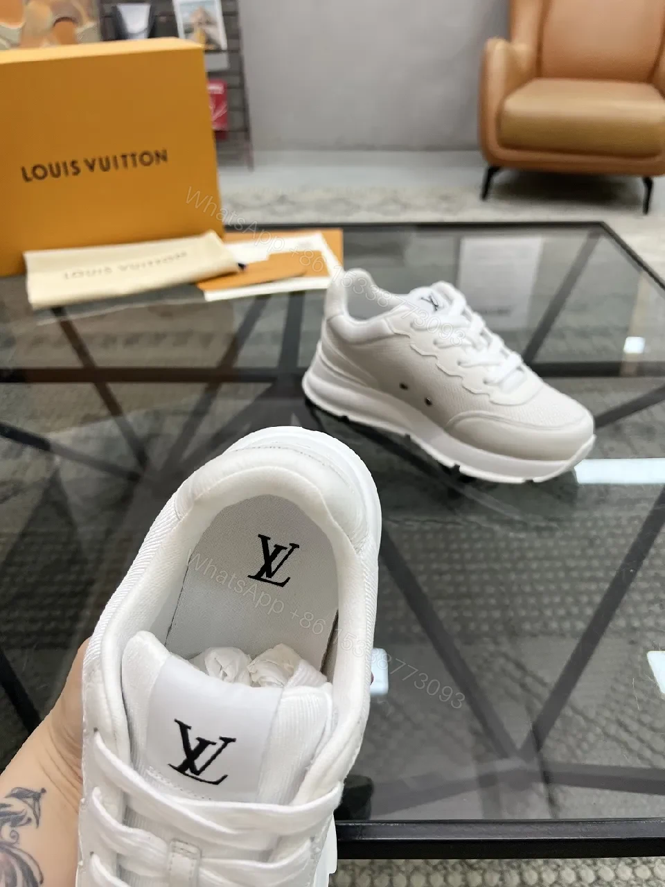 View 9 of White Leather Low-Top Luxury Sneakers with Subtle Logo Detail