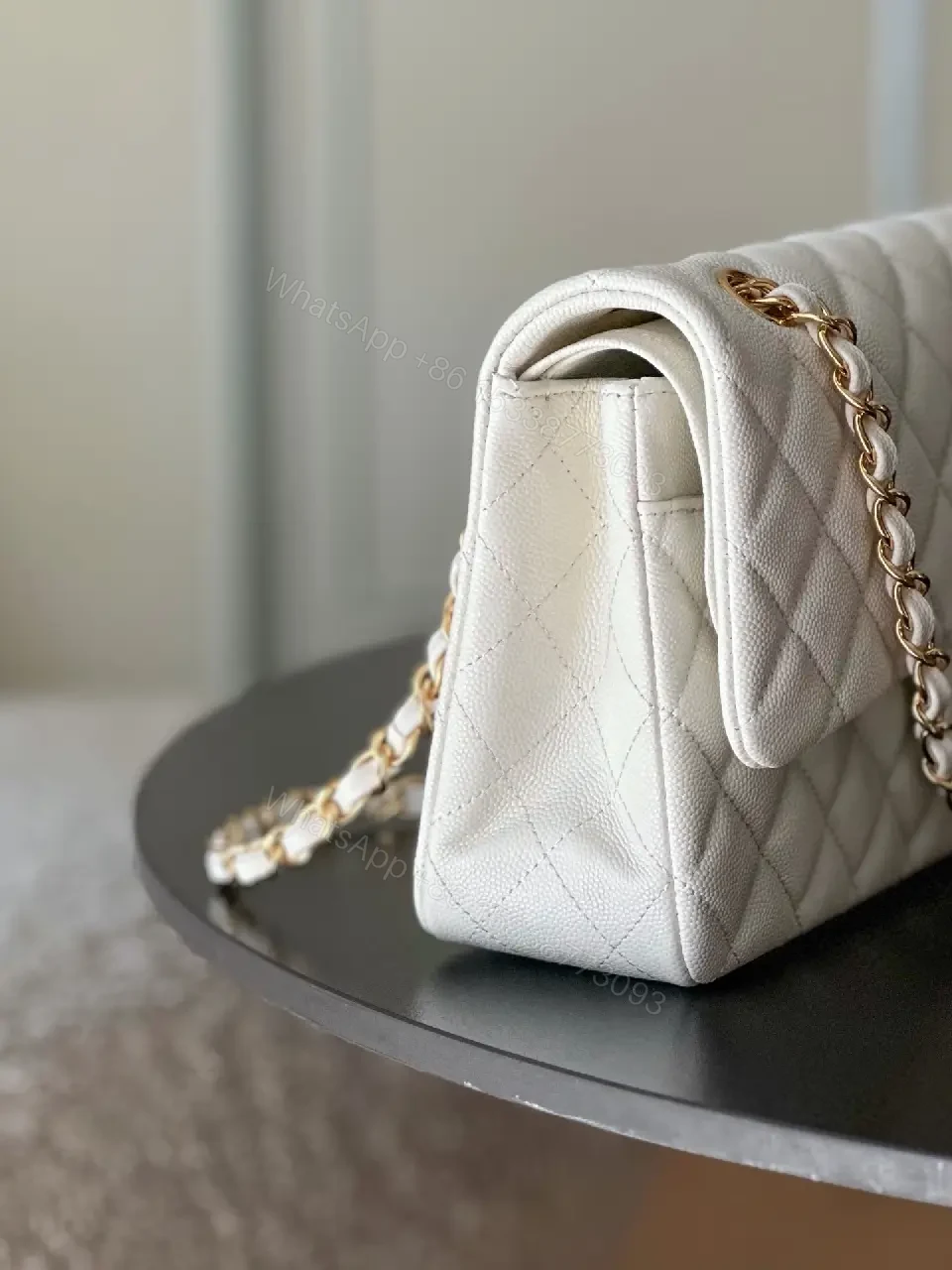 View 10 of Grey quilted leather chain-strap shoulder bag, luxury monogram-inspired pattern for everyday elegance