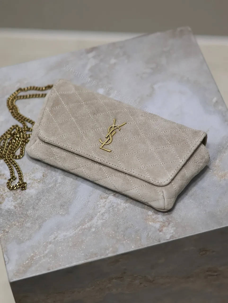 View 2 of Quilted Suede Clutch with Gold Logo Hardware - Classic Chic Clutch