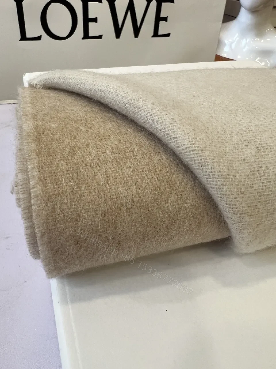 View 4 of Neutral Wool-Blend Scarf: Subtle Pattern, Elegant Fringe