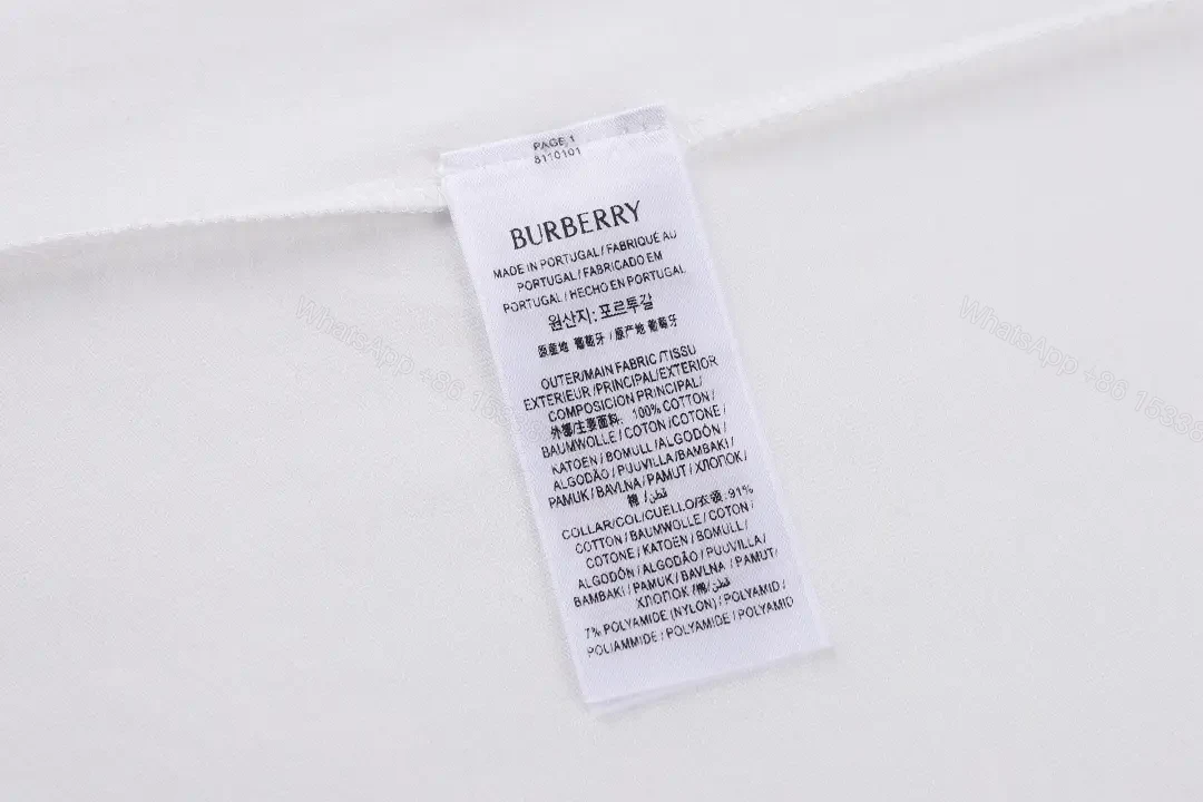 View 3 of Minimalist White Tee with Subtle Burberry Collar Detail