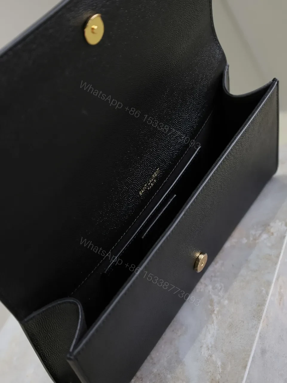 View 4 of Compact Black Calfskin Clutch with Gold-tone Hardware