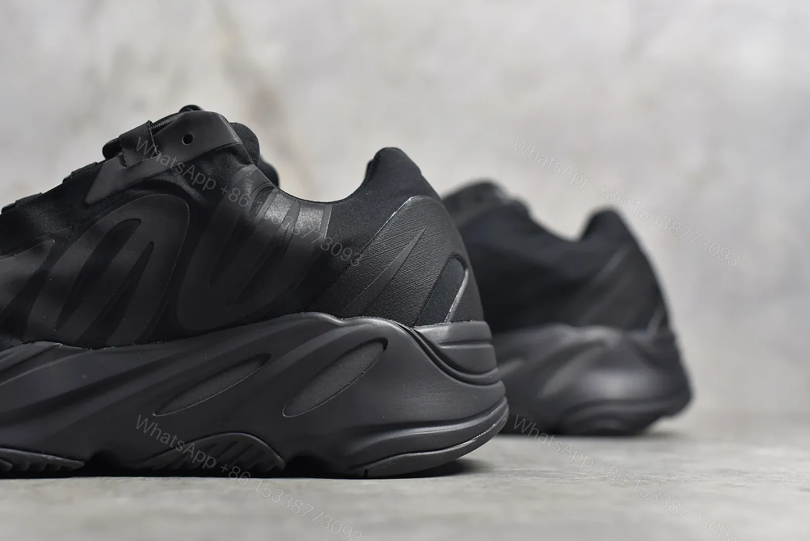 View 5 of Adidas Yeezy Boost 700 MNVN “Triple Black” Reps