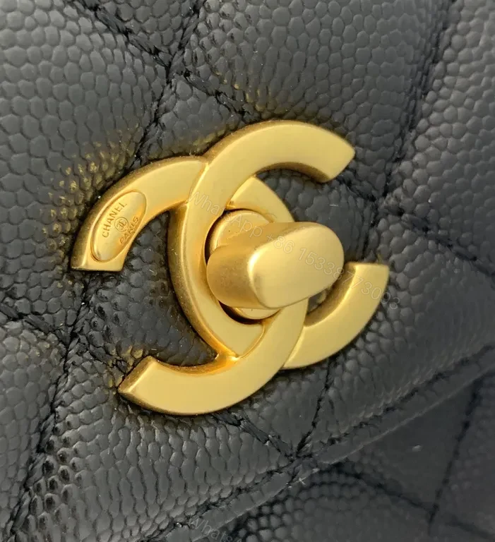View 7 of Chic Quilted Black Handbag with Gold Twist â€” All-Day Comfort