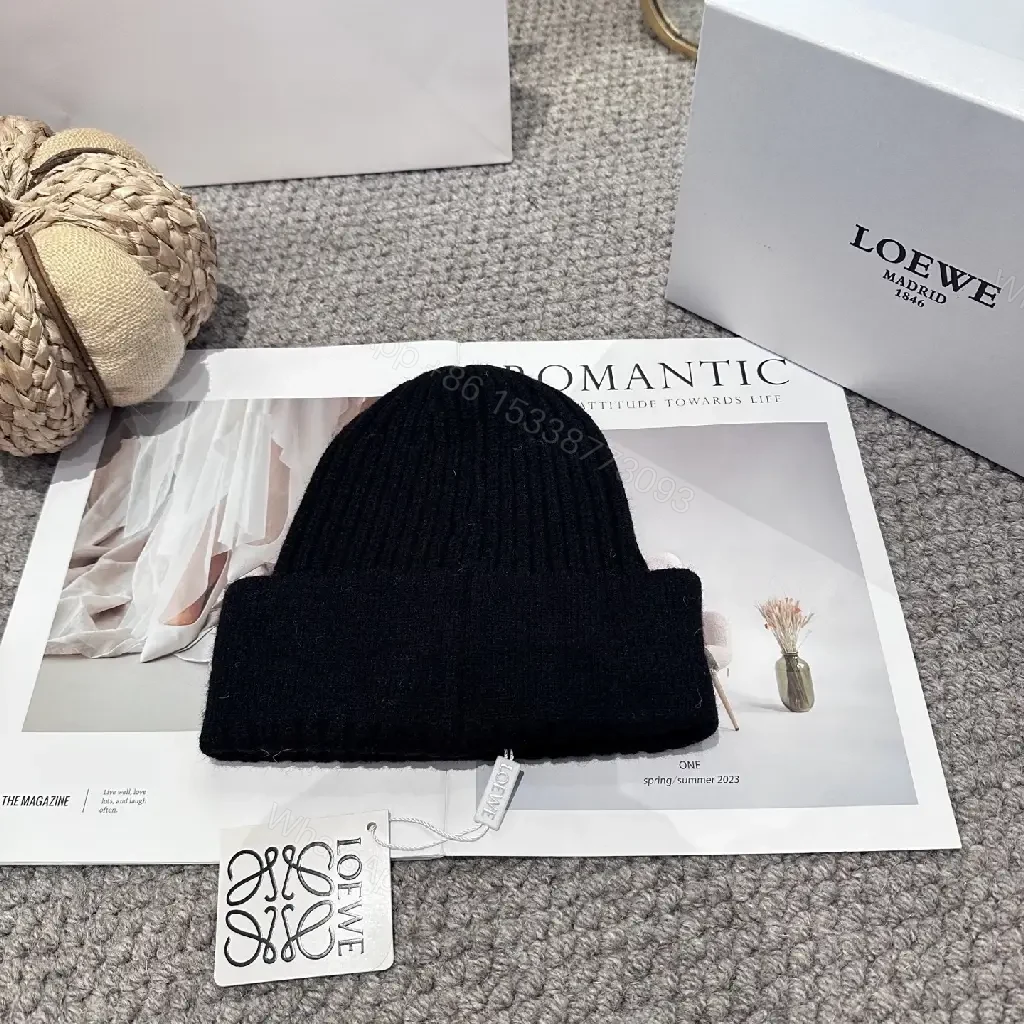 View 6 of Black Knit Beanie + Premium Knit + Chic Minimalist + LOEWE Logo Statement + Beanie