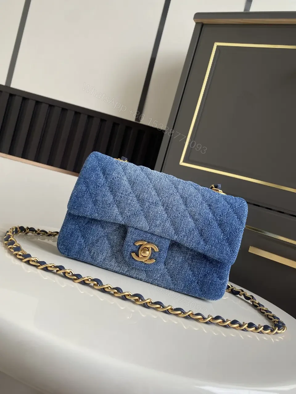 View 8 of Light Blue Denim Quilted Flap Bag with Gold CC Chain Strap