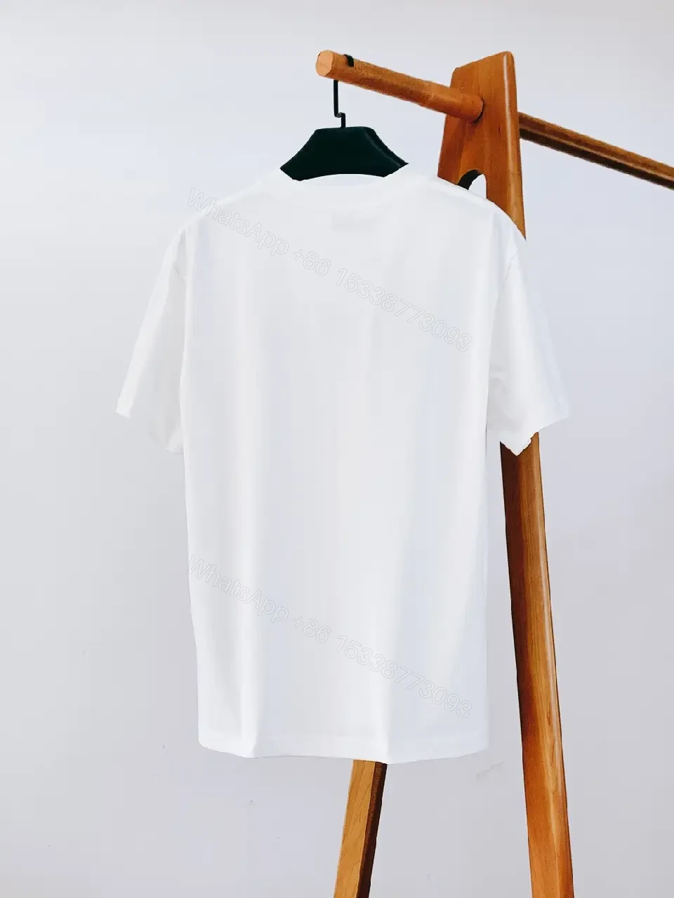 View 8 of White Cotton Logo Tee – Modern Luxury Essential T-Shirt