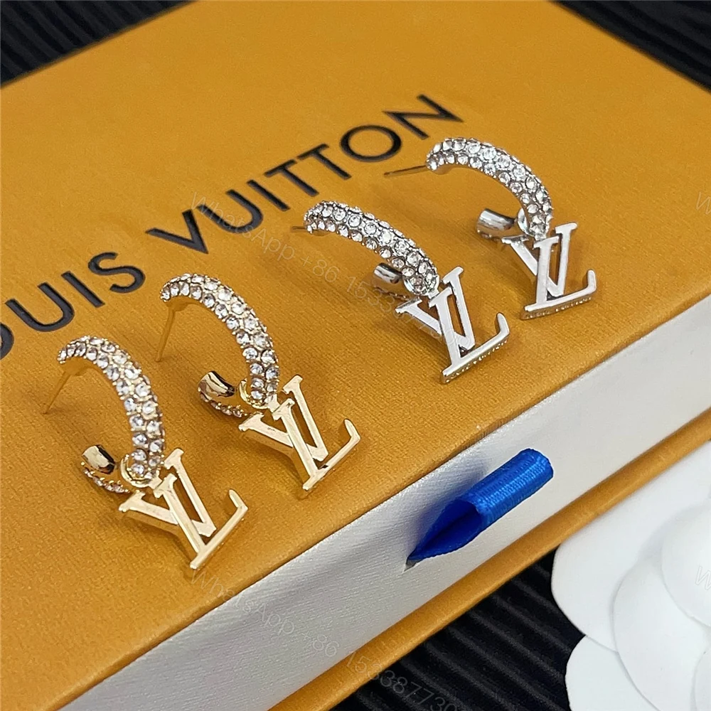 View 2 of LOUIS VUITTON LV ICONIC EARRINGS SILVER M02276