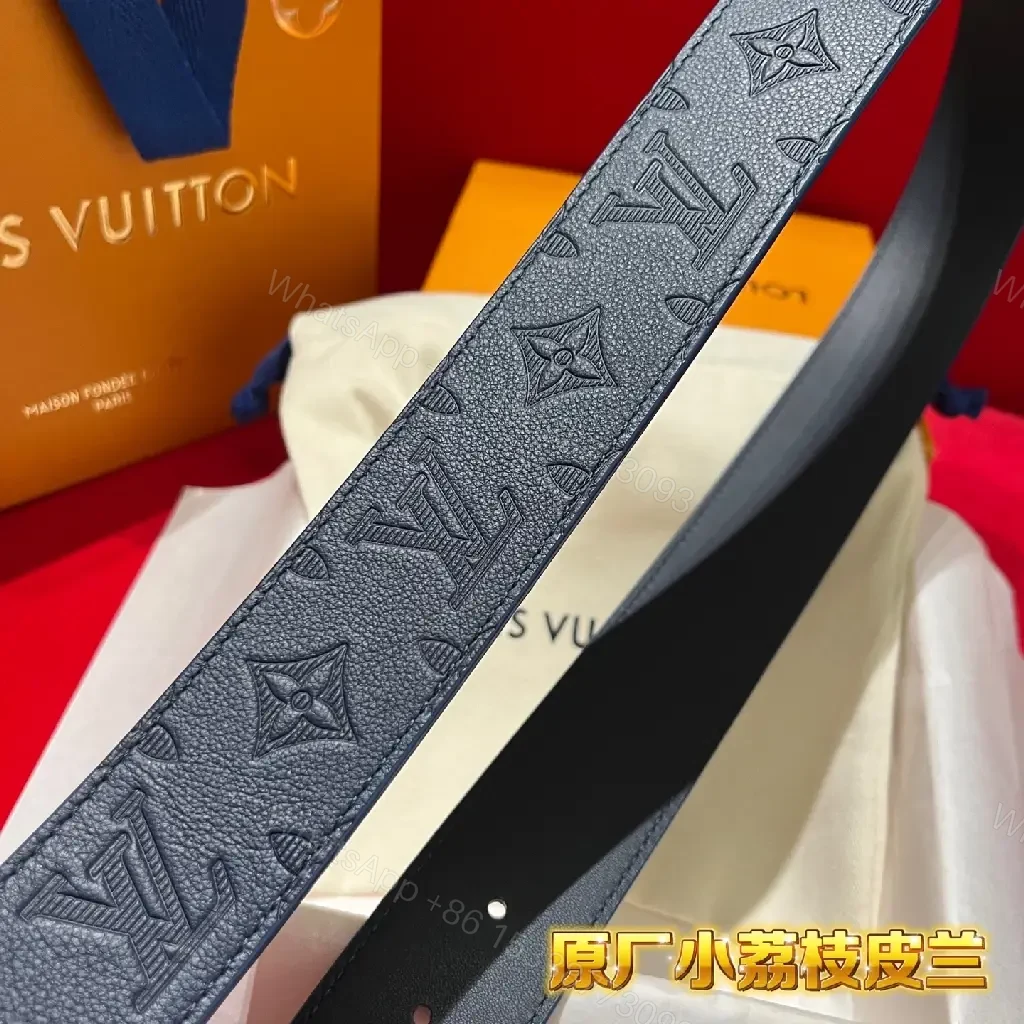 View 10 of Blue Embossed Monogram Belt: Luxe Everyday Accessory