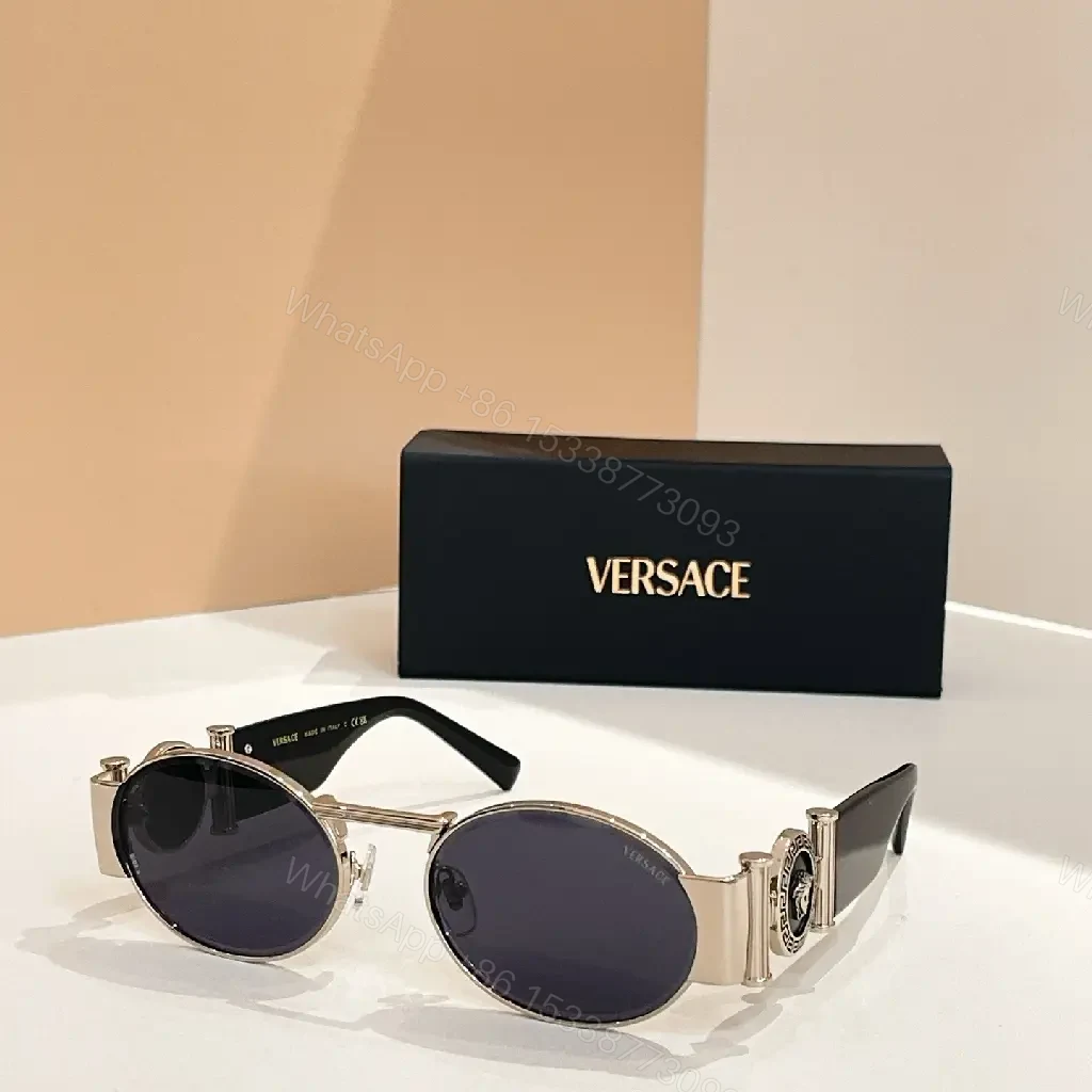 View 9 of Amber-Tinted Round Sunglasses: Gold-Accent, Sculpted Hardware, UV400 Shield